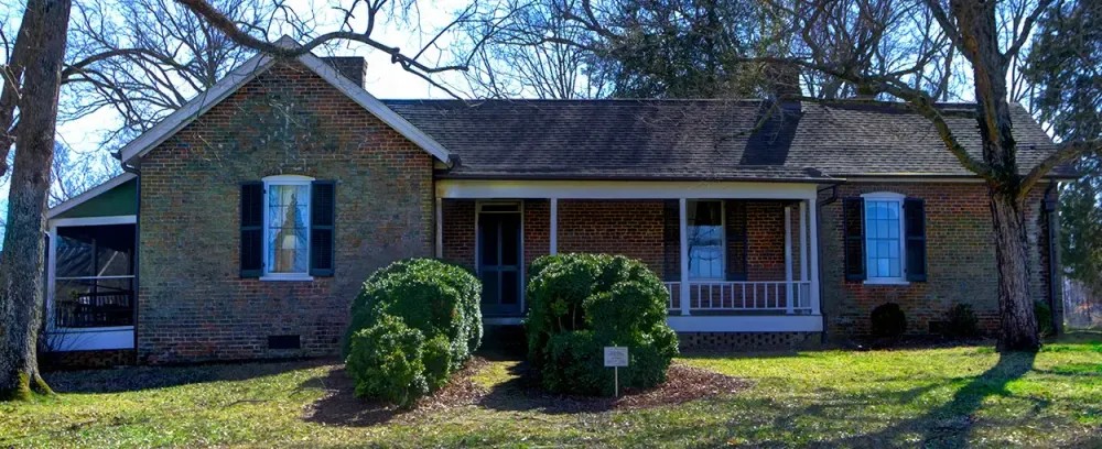 McVille Manor house home family architecture property building window yard roof estate suburban bungalow porch realty residential exterior mortgage door suburb driveway